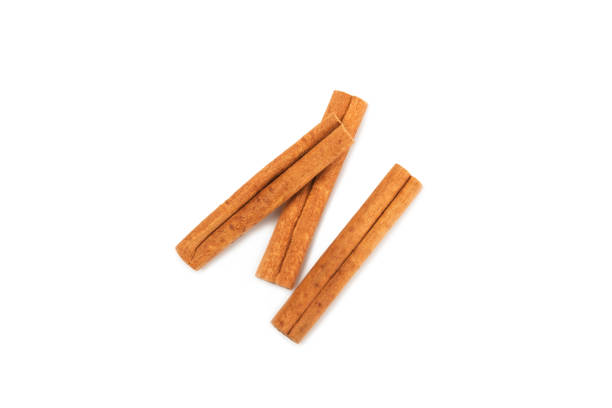 istock Cinnamon sticks on a textured wooden background. Cinnamon roll. Spicy spice for baking, desserts and drinks. Fragrant ground cinnamon. cinnamon powder Close-up. Place for text. copy space 2152196788
