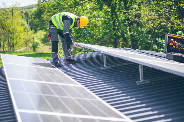istock Electrician is using a digital meter to measure the voltage at the power outlet in solar panel 2152197585