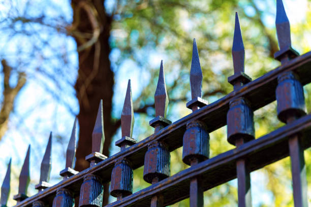 istock Top part of a metal fence with very sharp tips 2152201421