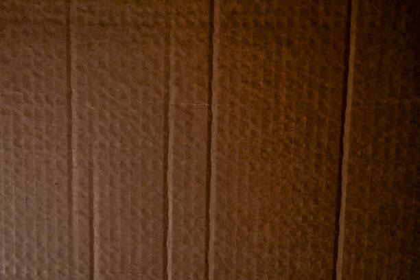 A brown cardboard box with a brown background