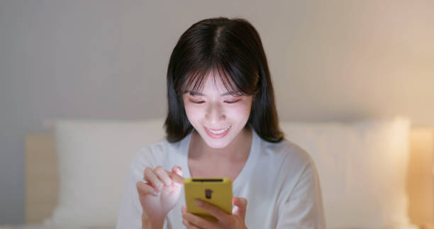 istock woman use smartphone happily 2152205763