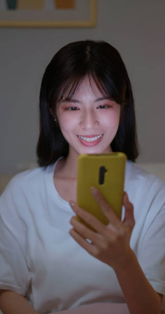 woman use smartphone happily