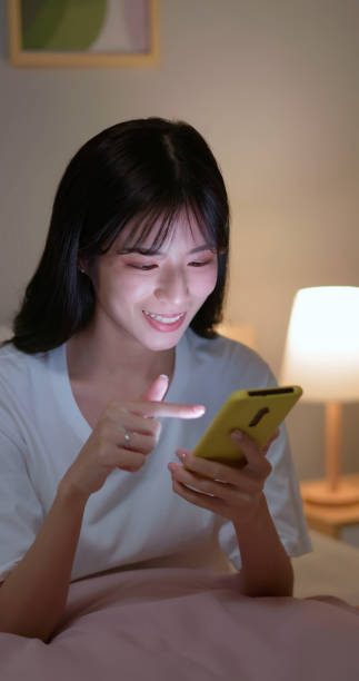 istock woman use smartphone happily 2152205789