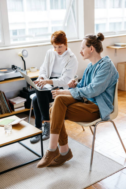 istock Freelance colleagues collaborating in modern co-working space 2152207511