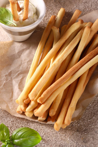 istock Grissini breadsticks with sauces for appetizers 2152207794