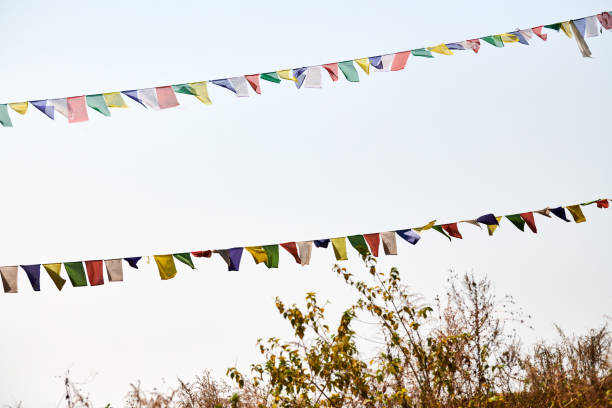 istock Colorful Tibetan prayer flags flutter ancient prayers into serene mountain wind 2152209754