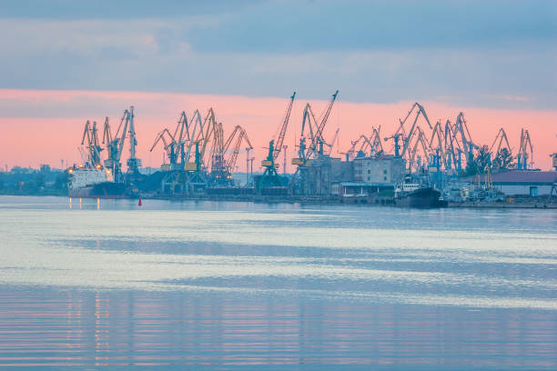 A sunrise over the harbor of Riga on a spring morning, view from Kipsala