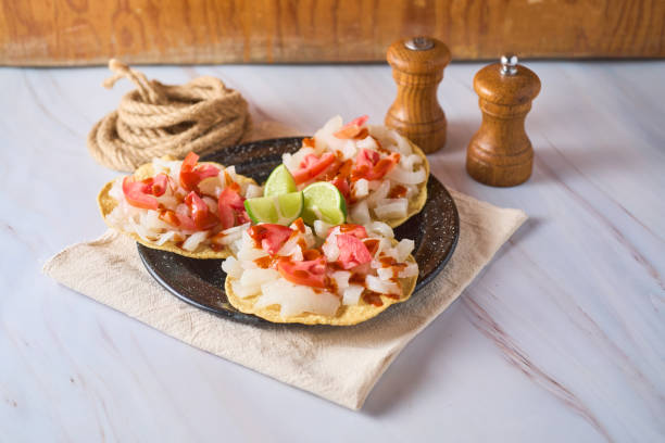 istock Cueritos tostadas with sauce and vegetables. 2152211971