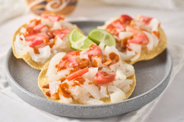 istock Cueritos tostadas with sauce and vegetables. 2152212063