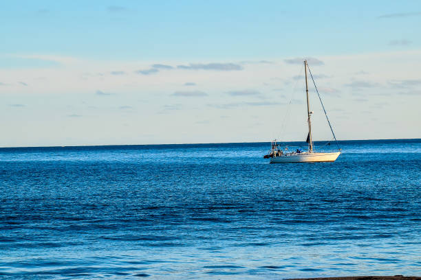 istock A sailboat is floating on the ocean 2152213440