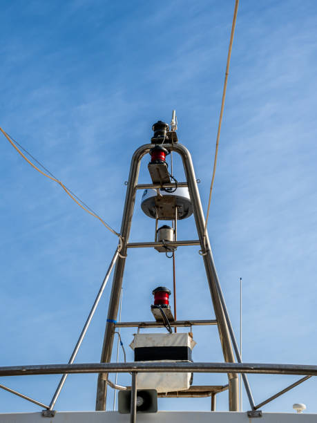 istock Ship signal communication mast stands tall, symbolizing essential connectivity and safety, offering a beacon of hope and reliability in maritime exploration with copy space for added customization. 2152218140