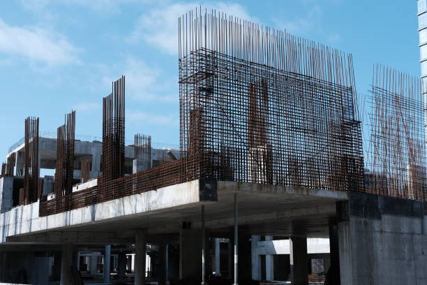 Rebars bars for concrete wall construction of a new building. Construction site. Iron structure ready to be cast with concrete. Steel bars construction for concreting. Brand new armature