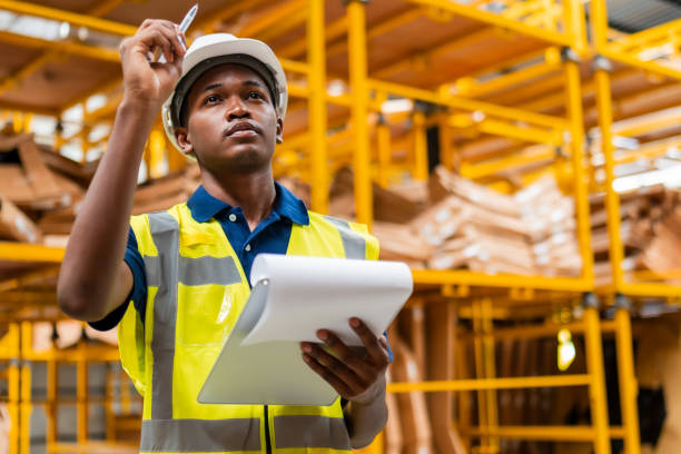 istock Warehouse Worker Managing Inventory with Clipboard 2152224080