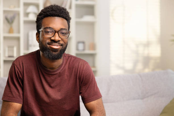 istock Happy Young Man Relaxing at Home on the Couch 2152225243