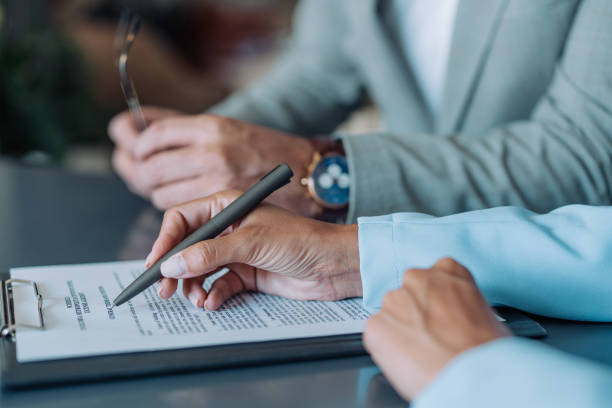 istock Business people signing a contract. 2152226565