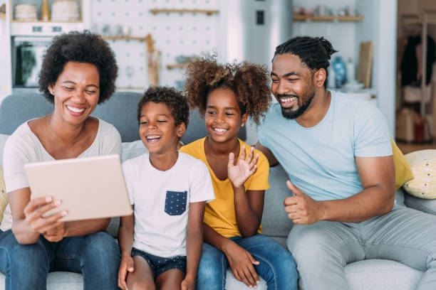 istock Family making video call at home. 2152226601