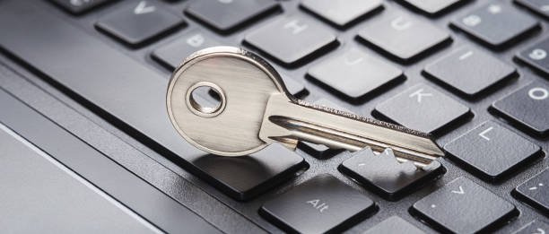 istock phishing, hacking personal data and money , key and hook on computer keyboard. 2152230790