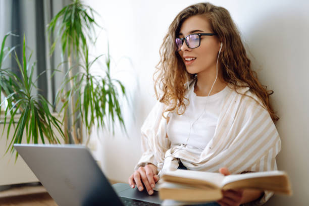istock Young  IT woman use work on laptop  stay at home, hotel. 2152232666
