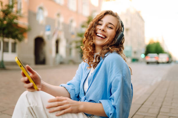 istock Young woman dancing and listening music. 2152234708