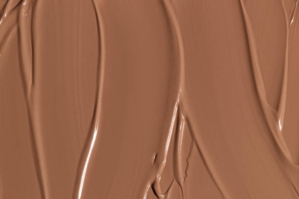 istock Makeup foundation, beige concealer swatch smudge smear. BB CC cream texture 2152235303