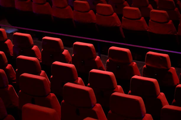 istock Red seats lined up in the theater 2152237088
