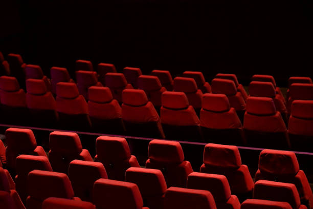 istock Red seats lined up in the theater 2152237090