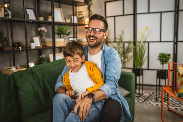 istock Dad hug son and share love with him spend time together at home 2152239332