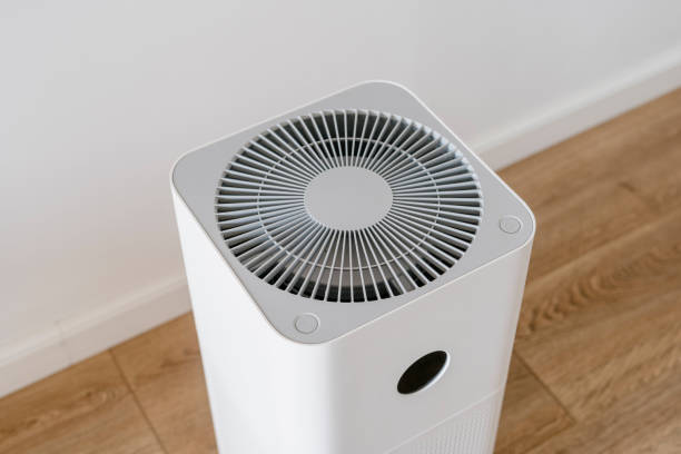 istock High angle view on household air purifier at modern apartment 2152242481