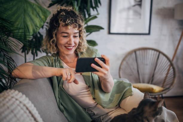 istock Woman enjoying a selfie with her cat at home 2152243035