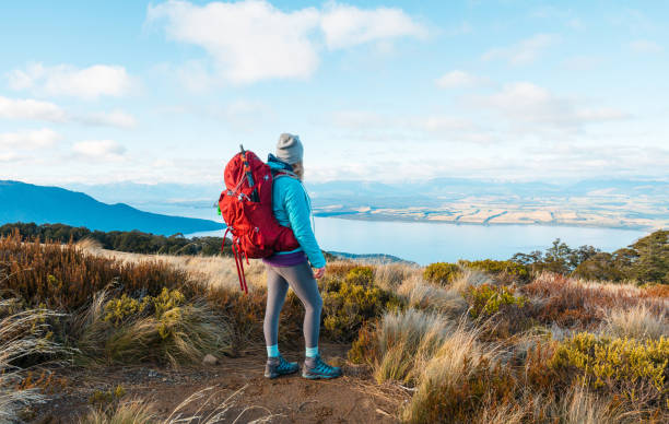 istock Woman hiker enjoying a view after a long hike. 2152243101