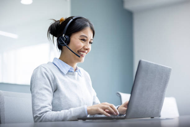 istock Businesswoman at the office talking a call while working using a headset 2152247316