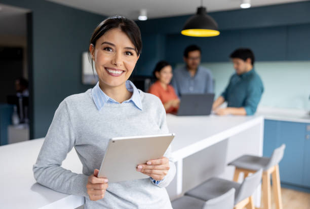istock Businesswoman working at a coworking office using a digital tablet 2152247337