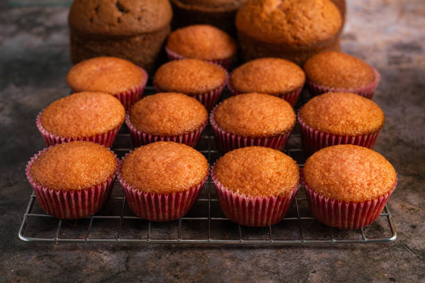 istock Freshly baked cupcakes ion pastry table. 2152248278