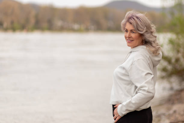 Free Stock Photo of Woman Standing on the Side of a River | Download ...