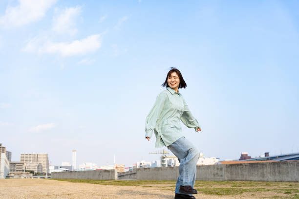 istock A woman having fun at the seaside 2152250892