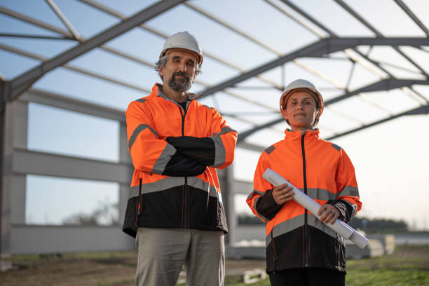istock Portrait, Civil Engineers Team at Metal Building Site. 2152254497