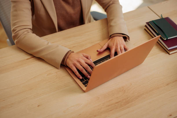 istock Closeup of woman working on a laptop 2152254877