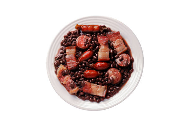 istock Brazilian feijoada, traditional food from Brazil cuisine, on ceramic plate isolated white background 2152255076