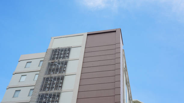 istock Contemporary architecture displayed through the structured design of an urban building, highlighted by sunlight and blue skies 2152257086