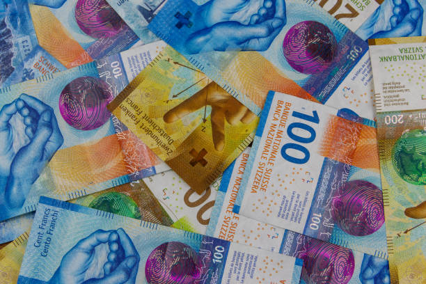 istock Background of the swiss francs banknotes 2152257658