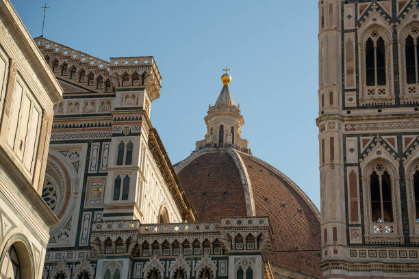 Distant view of the Florence Cathedral and adjacent Giotto's Bell Tower, highlighting the synergy of Florentine architecture