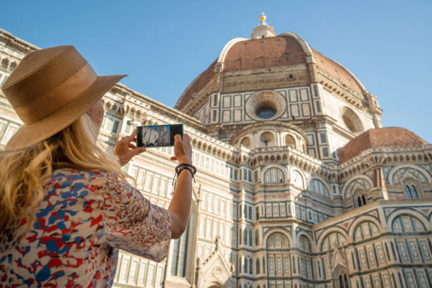 istock Blonde capturing Florence Cathedral on her phone 2152259521