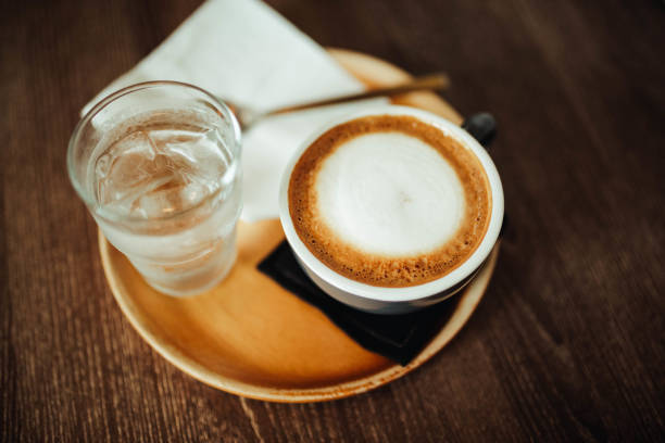 istock Cappuccino on the table in the cafe, ready to drink 2152260359