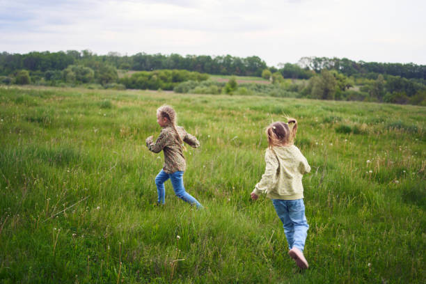 girls play catch-up in the field