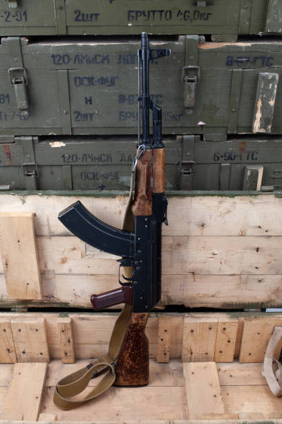 istock Kalashnikov AK47 gun in green crate 2152261505