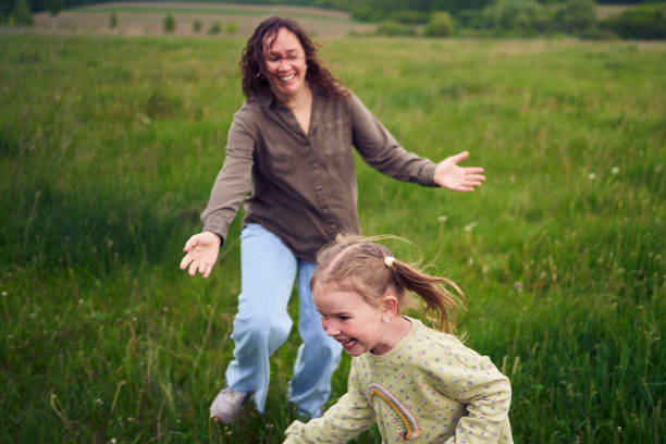a mother plays catch-up with her daughters