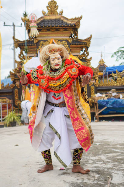 istock Balinese mask dance with temple background 2152263556