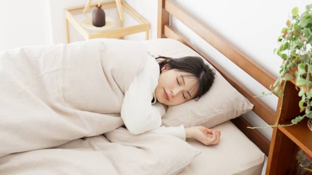istock Asian woman tossing and turning 2152267952