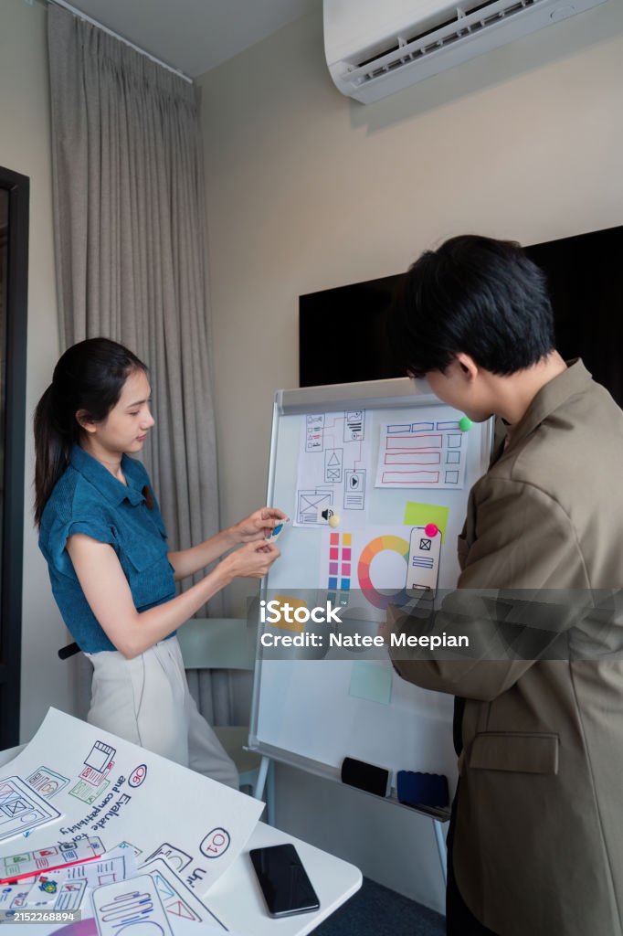 Ux Developer And Ui Designer Presenting Mobile App Interface Design On ...