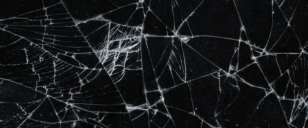 istock The pattern on the glass is cracked.  damage to the glass.  cracked texture 2152272540